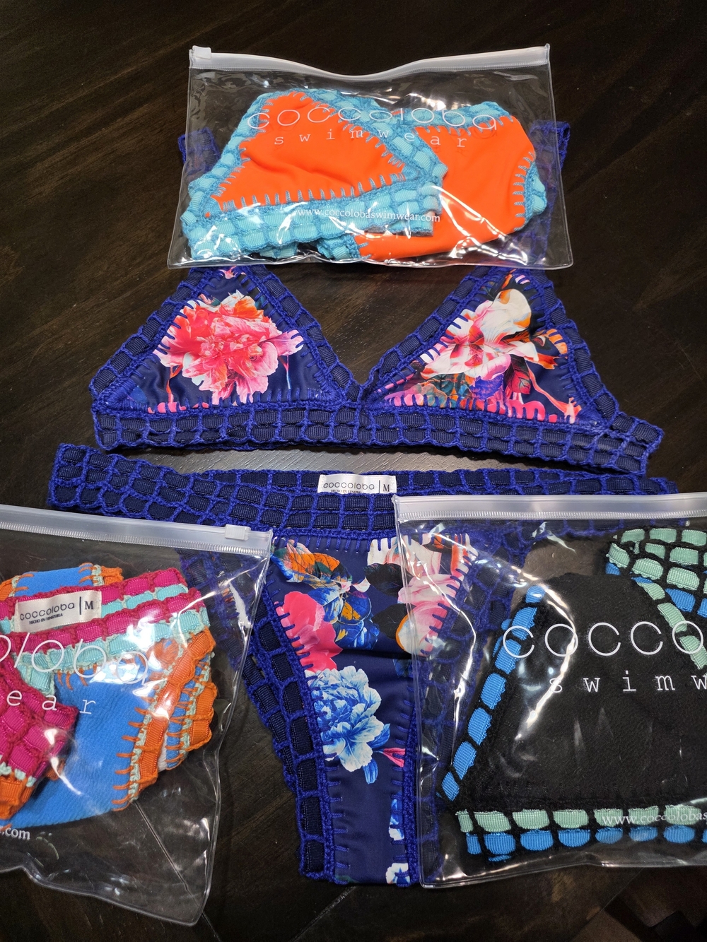 Coccoloba hand made crochet-trim bikinis. 250.00 For all 4